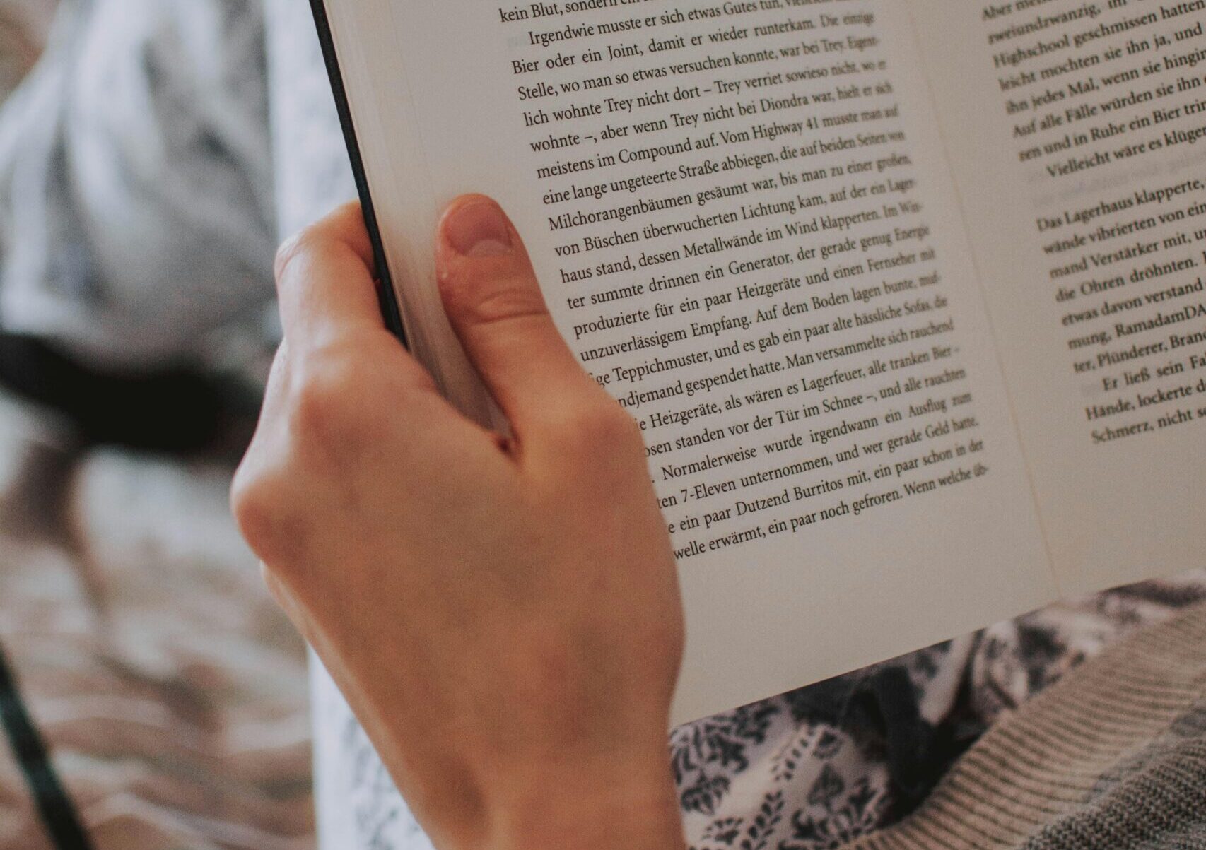 person-reading-a-book-1793025